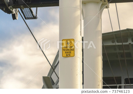 Sign on white post of chairlifts against cloudy sky in Park City at off season 73746123