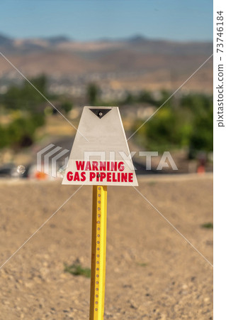 Selective focus of a Warning Gas Pipeline sign for security and safety Selective focus of a Warning Gas Pipeline sign for security and safety 73746184