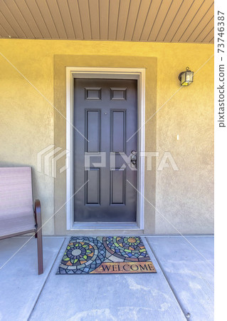 Colorful Welcome mosaic outside an entrance door Colorful Welcome mosaic outside an entrance door 73746387