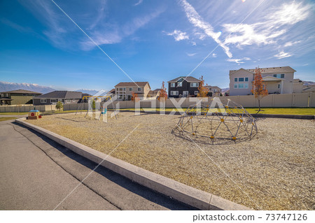 Climbing dome in a kids playground with walkway Climbing dome in a kids playground with walkway 73747126