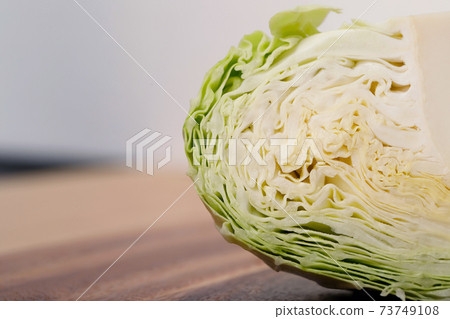 Green cabbage Ready to cook in the kitchen Green cabbage Ready to cook in the kitchen 73749108