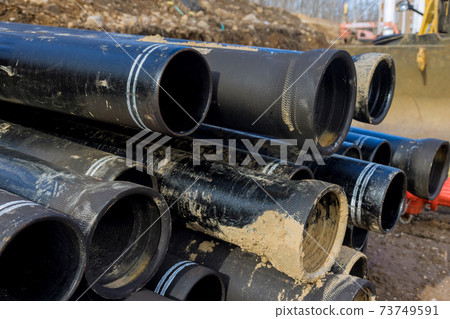 Polypropylene pipes for the water pipeline black plastic pipes. Polypropylene pipes for the water pipeline black plastic pipes. 73749591
