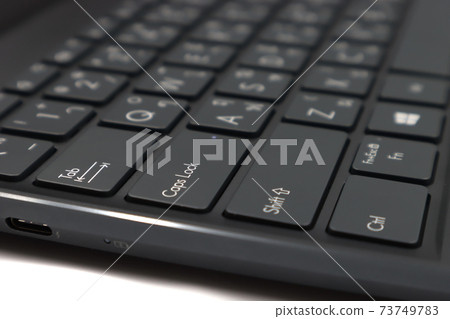 black Keyboard with the Caps Lock Key in the focus black Keyboard with the Caps Lock Key in the focus 73749783