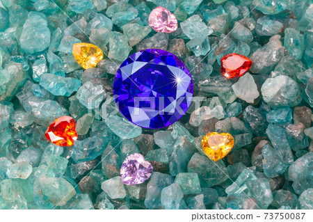 .Blue Sapphire diamonds are placed in an enclave of heart shaped diamonds. 73750087