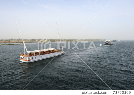 Scenery of the Nile River ・ Cruise ship on the Nile River (The Nile River in Egypt) 73750369