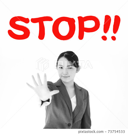 Image of business woman emphasizing STOP 73754533