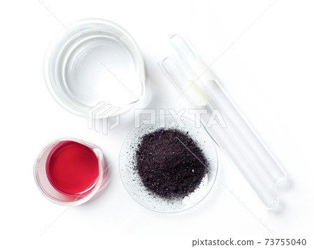 Cosmetic chemicals ingredient on white laboratory table. Potassium Permanganate Liquid, KMnO4, Alcohol. Top View Cosmetic chemicals ingredient on white laboratory table. Potassium Permanganate Liquid, KMnO4, Alcohol. Top View 73755040