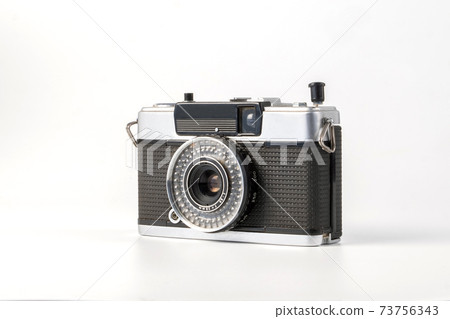 Antique old fashion film camera front view isolated on white background including clipping path 73756343