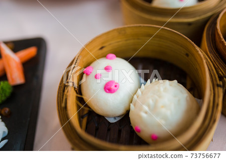 Chinese bun with minced pork stuffed in animal shaped Chinese bun with minced pork stuffed in animal shaped 73756677