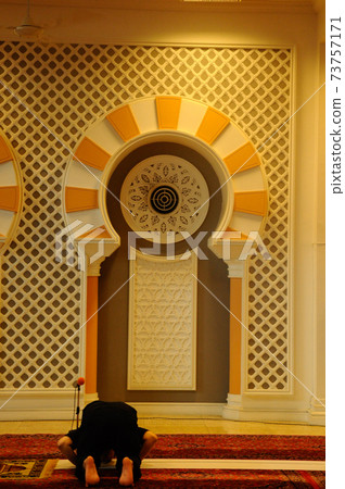 PETALING JAYA, MALAYSIA -JANUARY 01, 2015: Interior of Masjid Jamek Sultan Abdul Aziz at Petaling Jaya, Malaysia. Modern mosque and community building with Islamic design and architecture. PETALING JAYA, MALAYSIA -JANUARY 01, 2015: Interior of Masjid Jamek Sultan Abdul Aziz at Petaling Jaya, Malaysia. Modern mosque and community building with Islamic design and architecture. 73757171