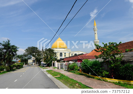 PETALING JAYA, MALAYSIA -JANUARY 01, 2015: Exterior of Masjid Jamek Sultan Abdul Aziz at Petaling Jaya, Malaysia. Modern mosque and community building with Islamic design and architecture.  73757212