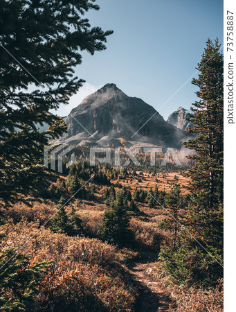 Rocky mountains with foggy in autumn forest at Assiniboine Provincial Park Rocky mountains with foggy in autumn forest at Assiniboine Provincial Park 73758887