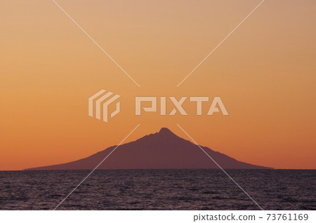 Mt. Rishiri at dusk as seen from Embetsu Town, Hokkaido (Rishirifuji) 73761169