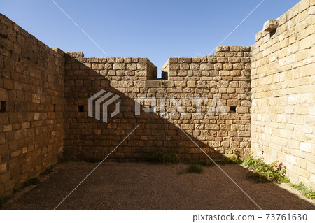 Defensive wall of the medieval Castle of Loarre, Huesca, Spain. 73761630