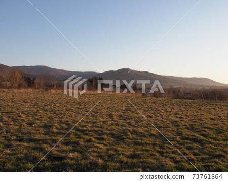 Great Silesian Beskid Mountains, Bielsko-Biala city, Poland, sun set 73761864