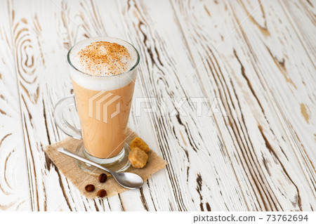 cup of cappuccino on table cup of cappuccino on table 73762694