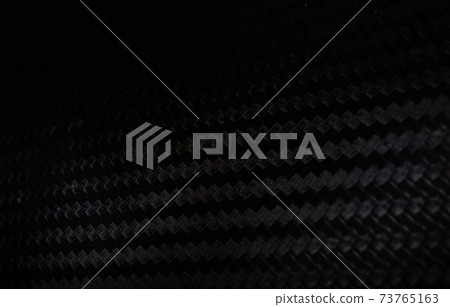 Carbon fiber texture background with right light Carbon fiber composite raw material background 73765163