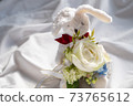 Rabbit and rose 73765612