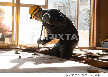 Home remodeling demolition site workers 73766108