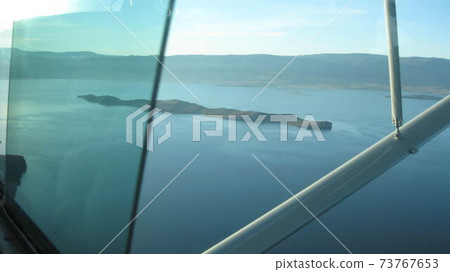 Russia, Lake Baikal, Olkhon Island. The northernmost point of the island of Olkhon. Aerial Photography Russia, Lake Baikal, Olkhon Island. The northernmost point of the island of Olkhon. Aerial Photography 73767653