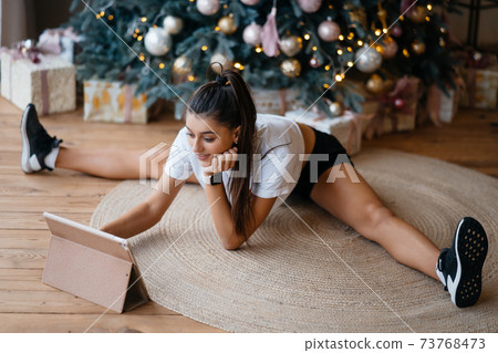 Woman having video call with their family or friends. Woman having video call with their family or friends. 73768473