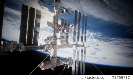 A view of the Earth and a spaceship. ISS is orbiting the Earth 73769717