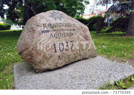 Stone signpost of Amber road sights in Kaliningrad 73770395