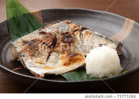 Grilled mackerel with salt Grilled mackerel with salt 73773268