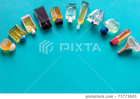 Perfume mockup. Top view set of portable perfume bottle, mini bottles of various shapes.  73773603