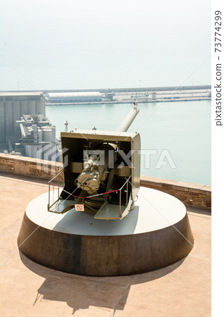 Cannon of Montjuic Castle on a hill overlooking the harbor of Barcelona, Spain Cannon of Montjuic Castle on a hill overlooking the harbor of Barcelona, Spain 73774299