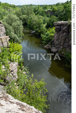Buky Canyon summer landscape, Hirskyi Tikych river, Cherkasy Region, Ukraine. Buky Canyon summer landscape, Hirskyi Tikych river, Cherkasy Region, Ukraine. 73774902