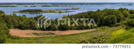 Dnipro river shores summer panoramic landscape, Kaniv water Reservoir, Kyiv Region, Ukraine. 73774931