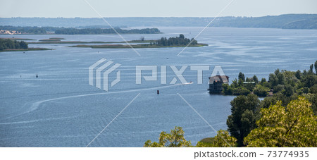 Dnipro river summer panoramic landscape, Kaniv water Reservoir, Kyiv Region, Ukraine. Dnipro river summer panoramic landscape, Kaniv water Reservoir, Kyiv Region, Ukraine. 73774935