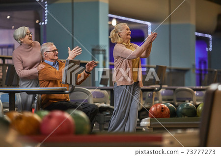 Joyful Senior People Playing Bowling Joyful Senior People Playing Bowling 73777273
