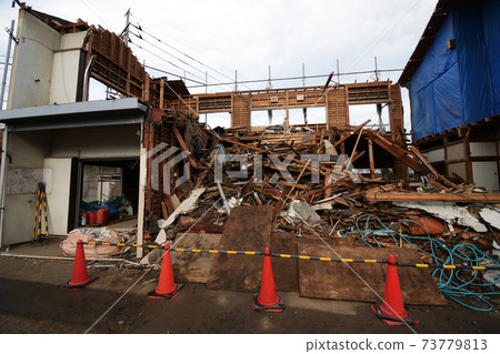 Wooden apartment demolition site Wooden apartment demolition site 73779813