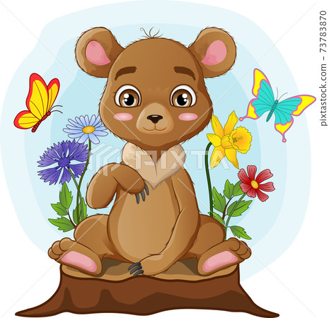 Cute little bear sitting on tree stump 73783870