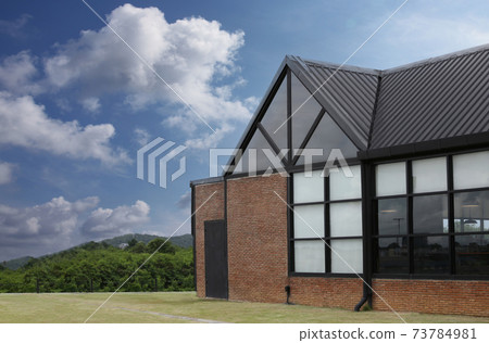 House at the foothills is quiet on a clear day. House at the foothills is quiet on a clear day. 73784981