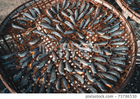 Fish and squid Dried seafood in bamboo baskets Fish and squid Dried seafood in bamboo baskets 73786530