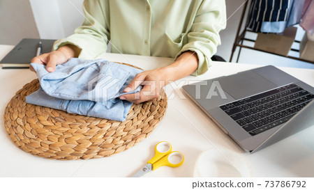 Online small business entrepreneur merchants working at store preparing products to deliver to customers, startup and online business concept. 73786792