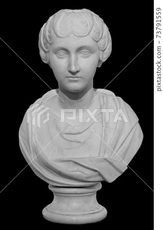 Ancient white marble sculpture bust of Faustina the Younger. Wife of Roman Emperor Marcus Aurelius. Statue of young woman isolated on black Ancient white marble sculpture bust of Faustina the Younger. Wife of Roman Emperor Marcus Aurelius. Statue of young woman isolated on black 73791559