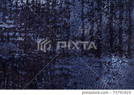 Dark navy blue and denim fluffy background of soft, fleecy velvet fabric. 73791929