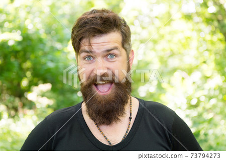 The beard with depth and texture. Bearded man smiling The beard with depth and texture. Bearded man smiling 73794273