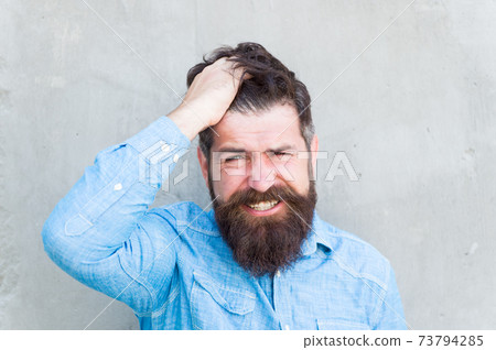 Pain and migraine. Man bearded hipster painful grimace. Pain and migraine. Man bearded hipster painful grimace. 73794285