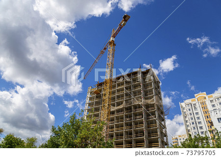 Multi-storey building under construction (new residential complex). Construction site upon renovation program in Cheryomushki district, Moscow, Russia Multi-storey building under construction (new residential complex). Construction site upon renovation program in Cheryomushki district, Moscow, Russia 73795705
