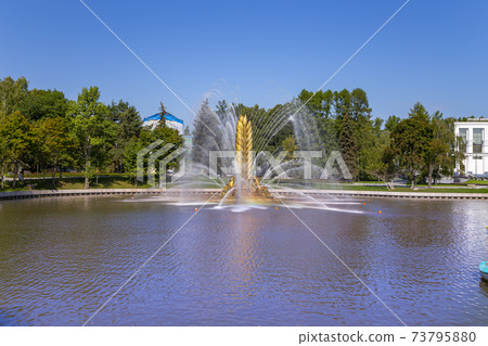 Golden Spike fountain on Kamensky pond in VDNH park. VDNKh (called also All-Russian Exhibition Center) is a permanent general-purpose trade show in Moscow, Russia 73795880