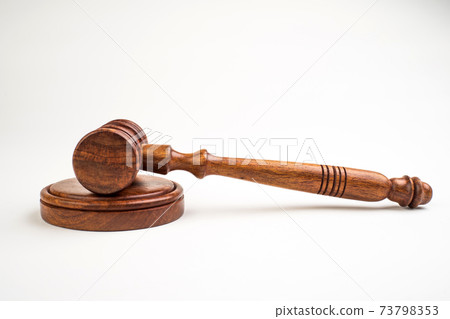 Judge's gavel on light background, top view. Law concept 73798353