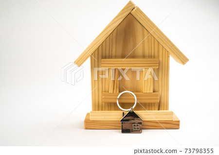Close-up of toy house model on white background 73798355