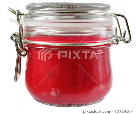 Cream honey with cherries in a glass jar Cream honey with cherries in a glass jar 73799164