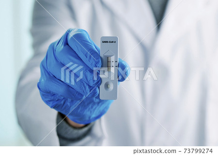 healthcare worker with a positive covid-19 test 73799274