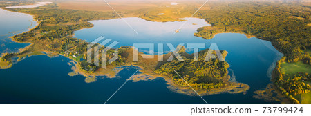 Braslaw District, Vitebsk Voblast, Belarus. Aerial View Of Lakes, Green Forest Landscape. Top View Of Beautiful European Nature From High Attitude. Bird's Eye View. Famous Lakes. Panorama Braslaw District, Vitebsk Voblast, Belarus. Aerial View Of Lakes, Green Forest Landscape. Top View Of Beautiful European Nature From High Attitude. Bird's Eye View. Famous Lakes. Panorama 73799424